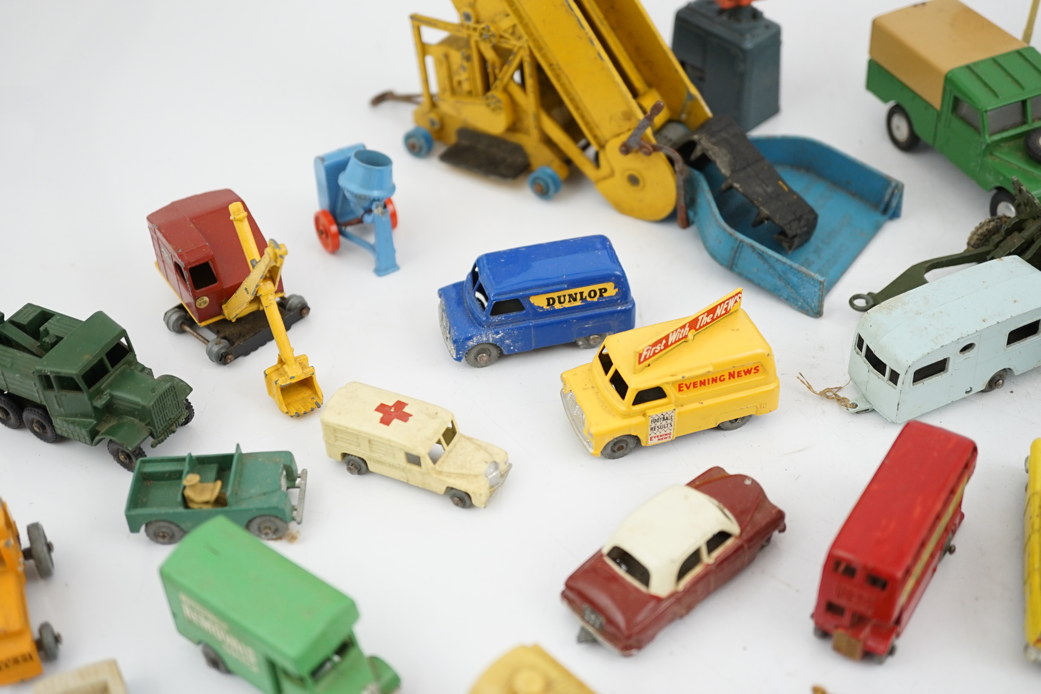 Thirty-eight diecast vehicles by Dinky Toys, Corgi Toys, Matchbox, etc. including a Spot-On BMW Isetta, military Dinky vehicles, Matchbox Series, etc.